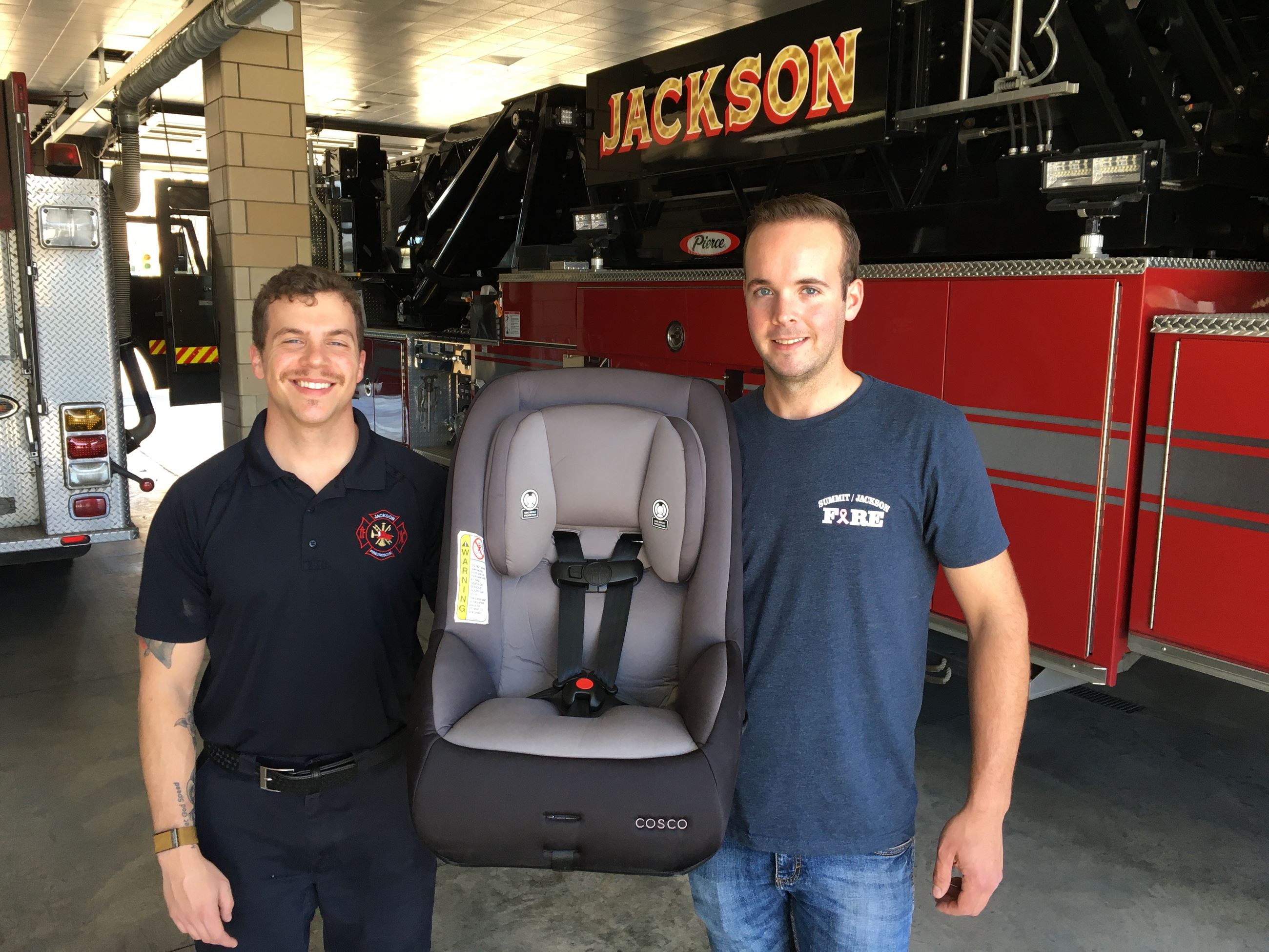 Public safety personnel with car seats