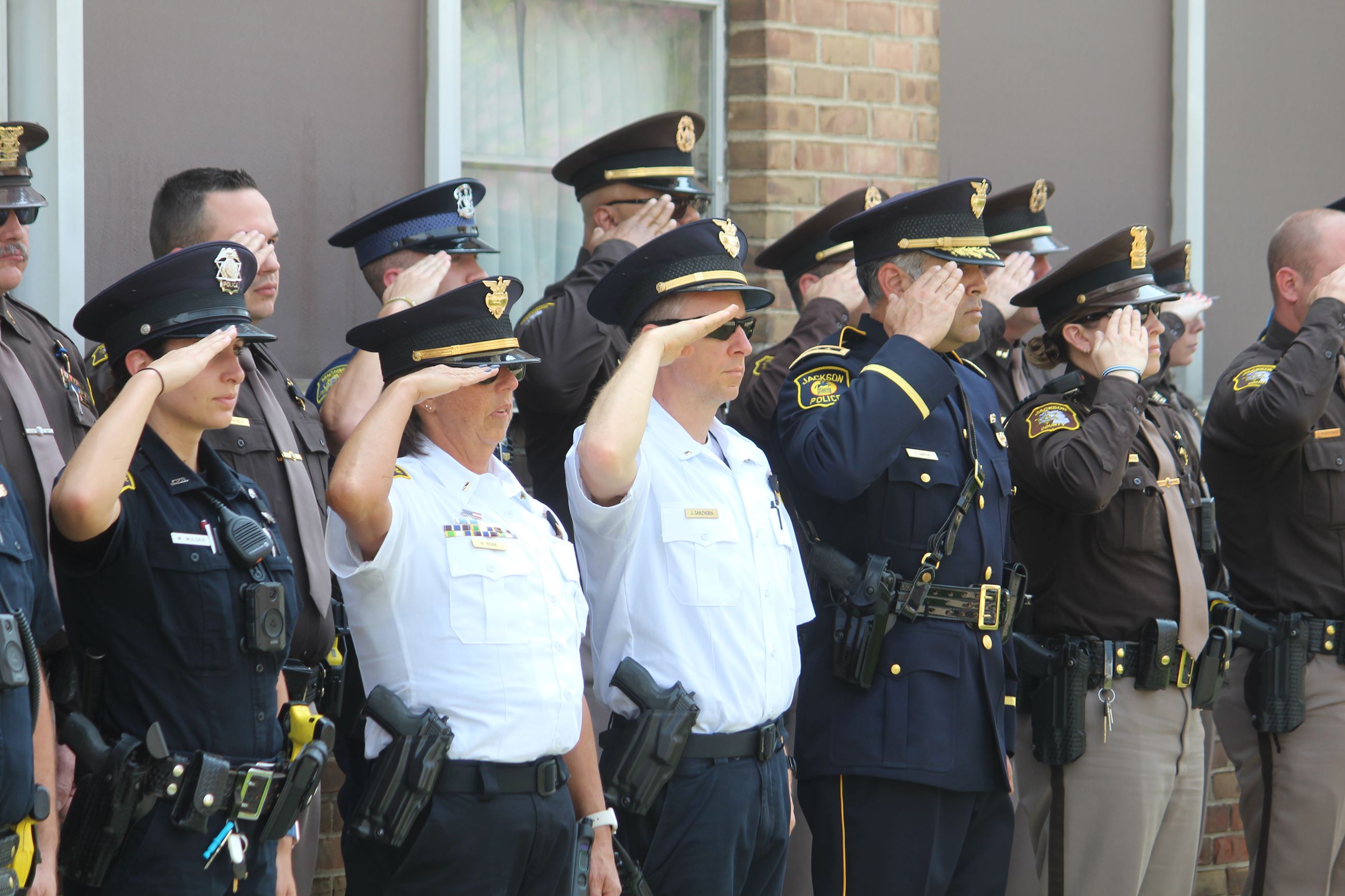 Officers salute in a row at Jackson Law Enforcement Memorial 2022