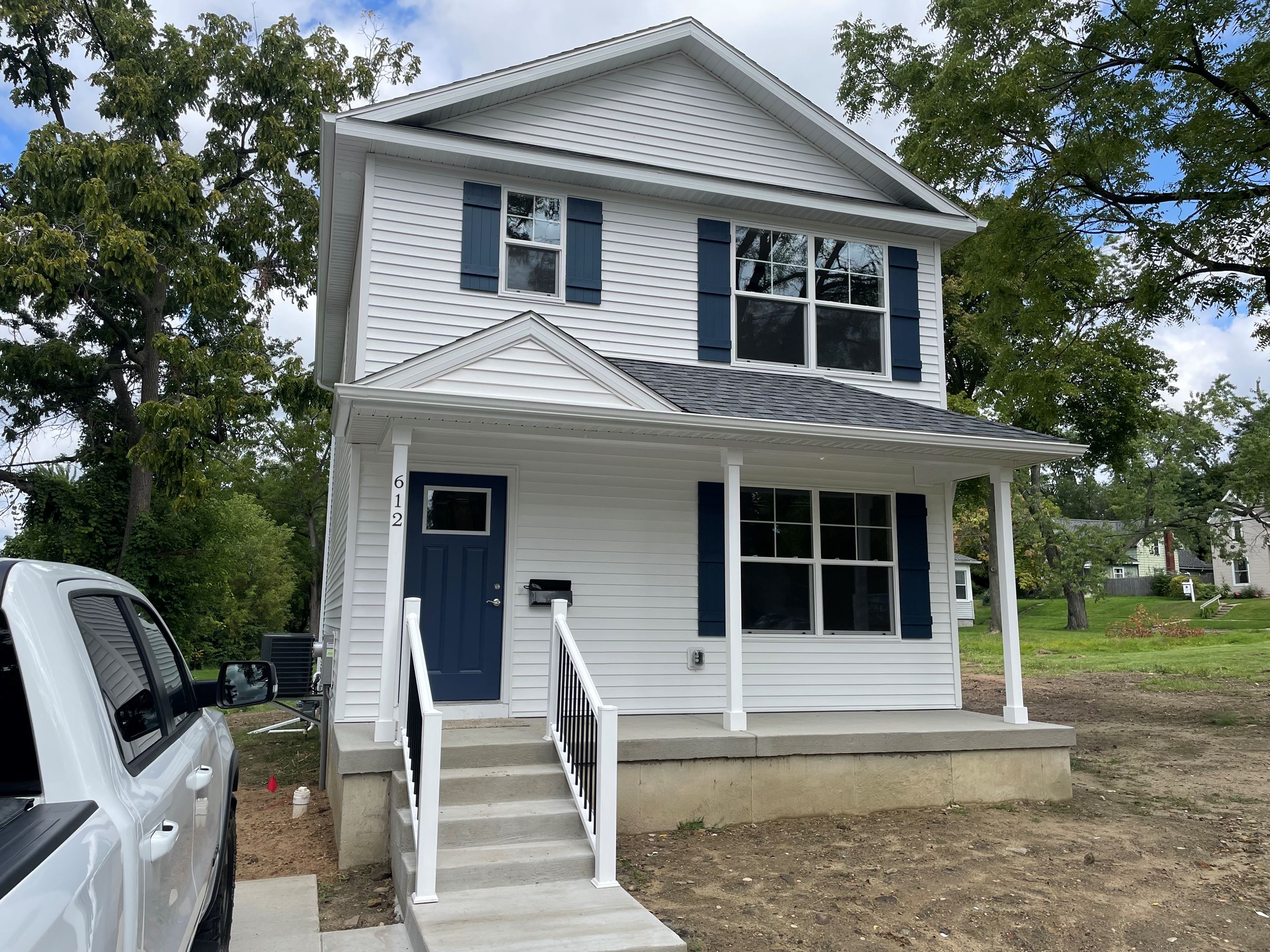 A 2 story white house 